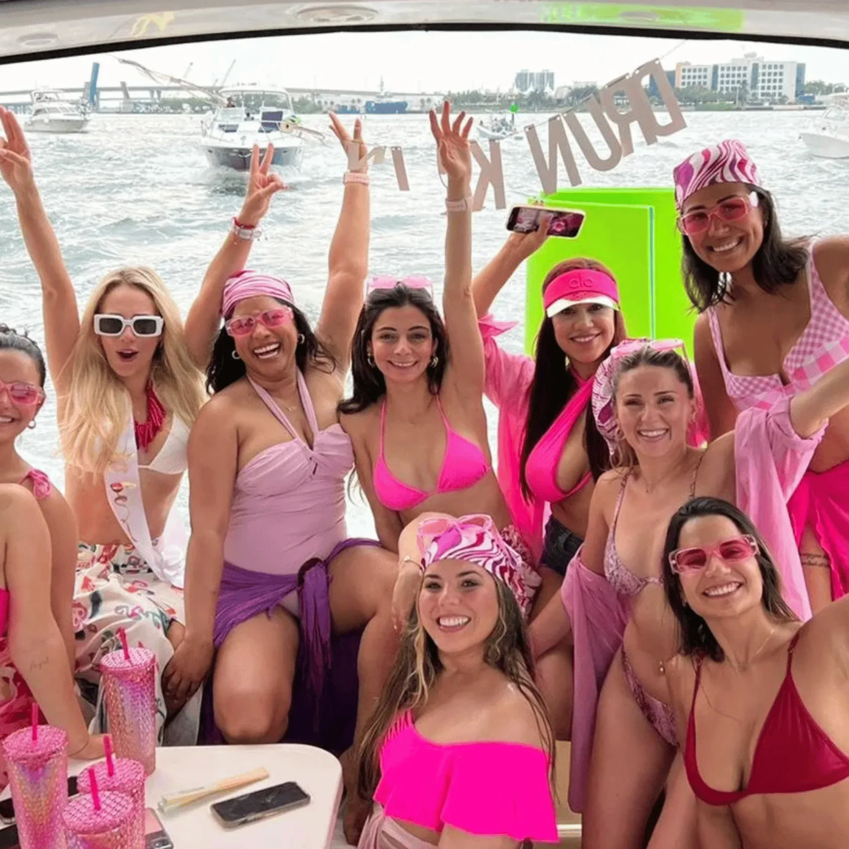 miami beach bachelorette boat party group on water near sandbar