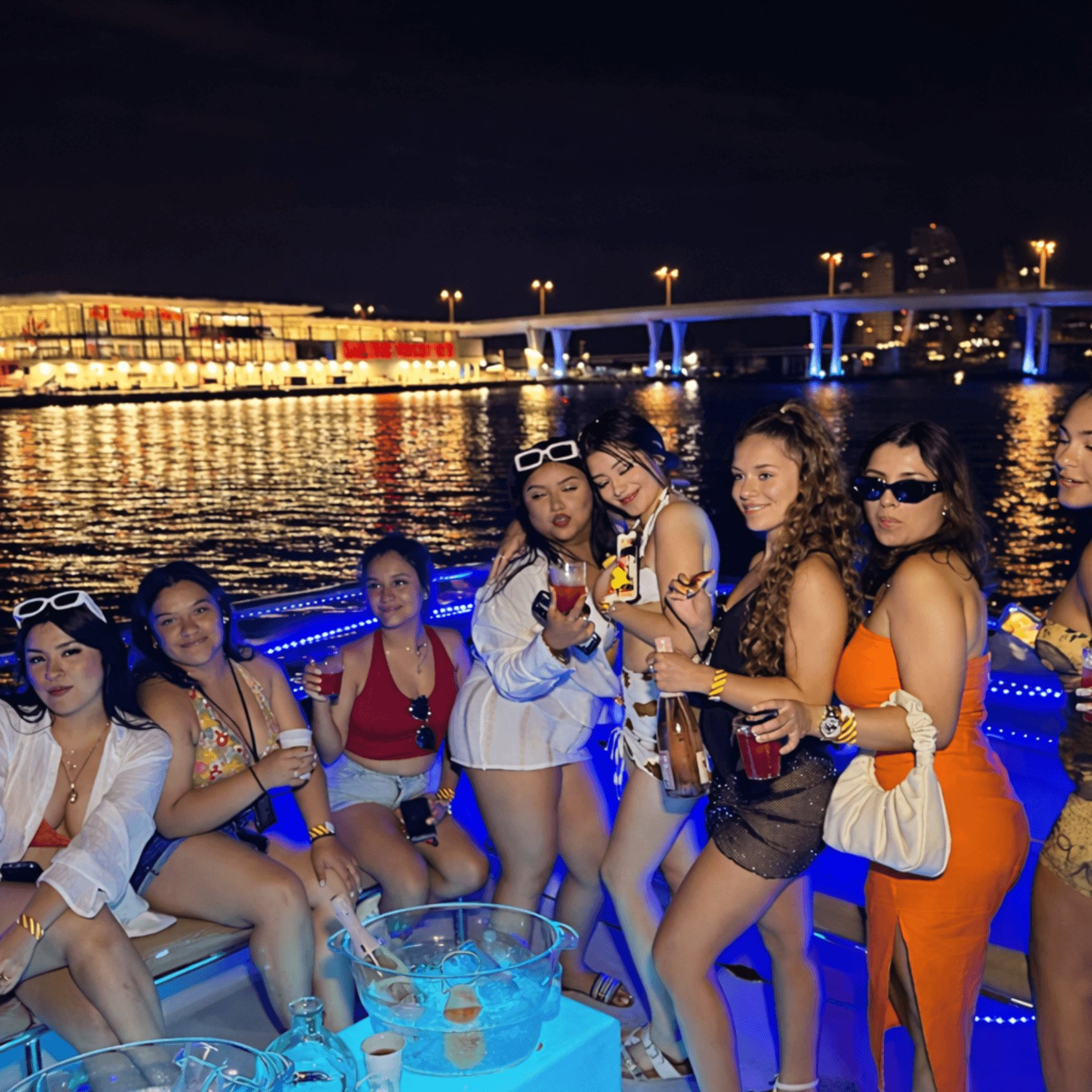 Night yacht party with drinks in Miami