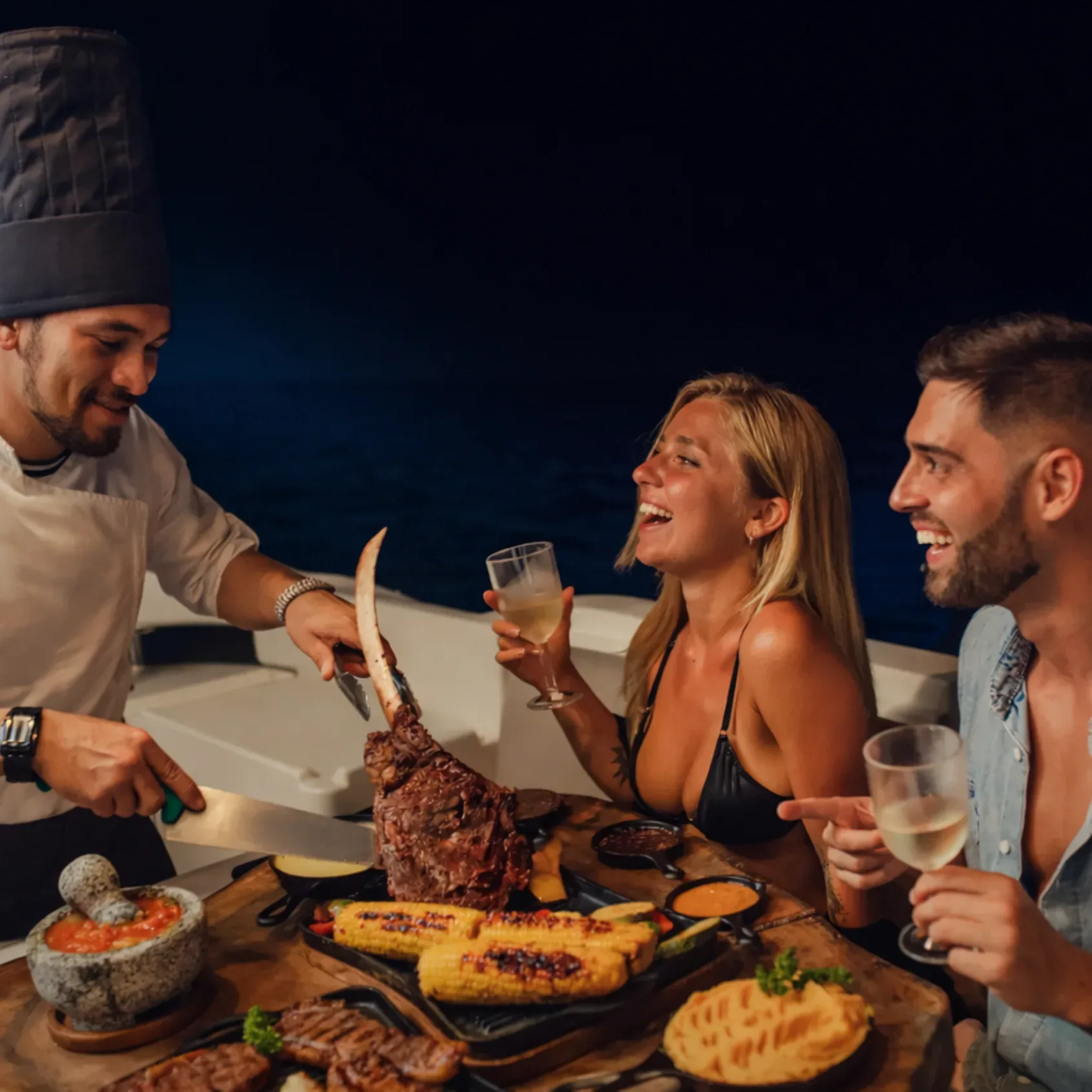 Private chef serving a romantic dinner on a yacht in Miami