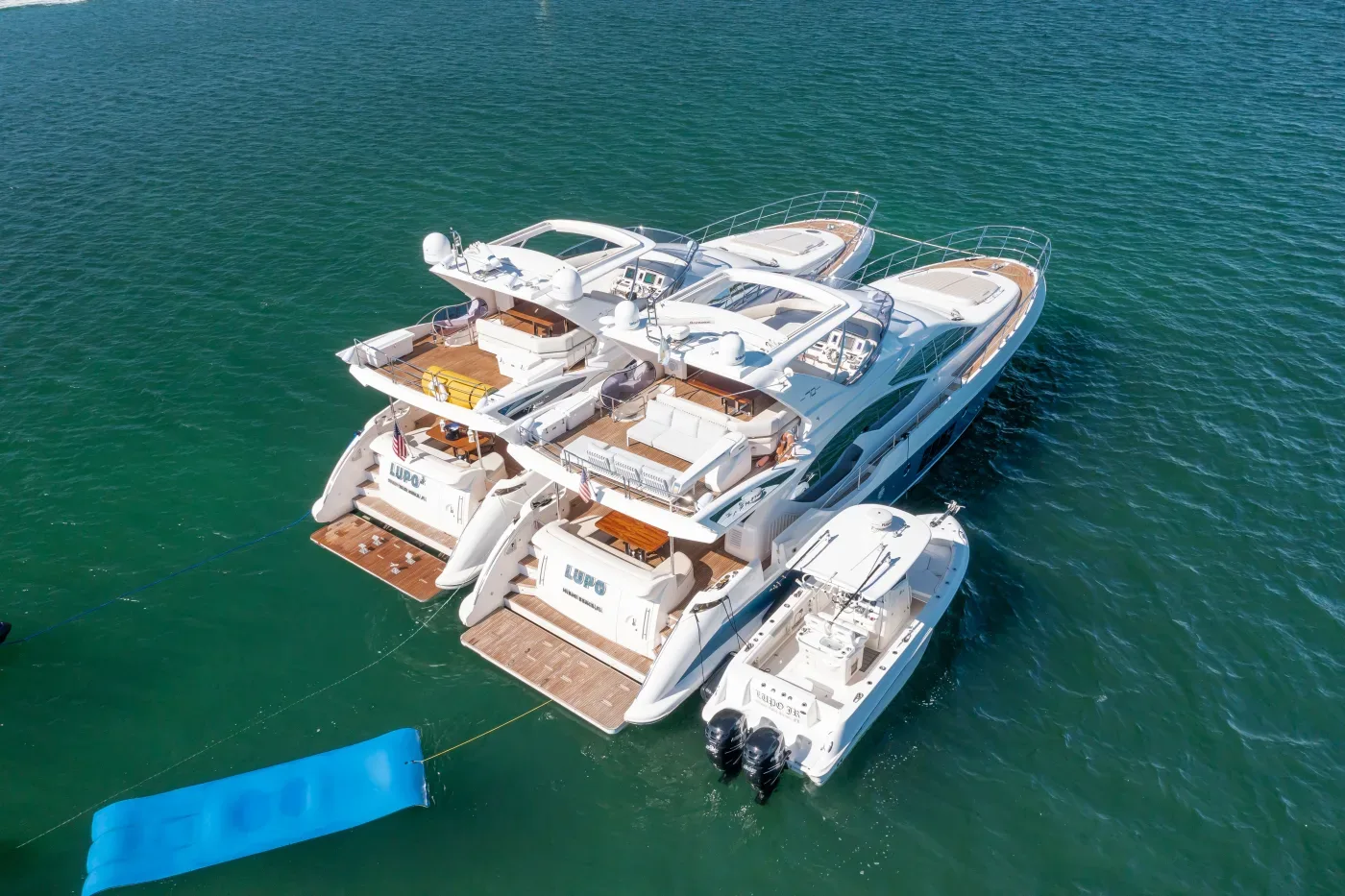 Twin yacht formation for 20 guest yacht rental miami, two boats anchored side by side on Biscayne Bay